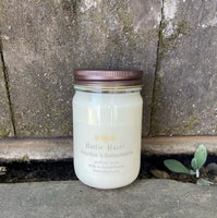 bourbon and butterscotch soy candle in clear jar