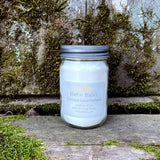 coconut lime verbena soy candle in clear jar with metal lid