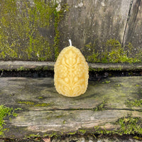 beeswax carved egg shaped candle