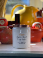 indoor picture of orange blossom soy candle on shelf